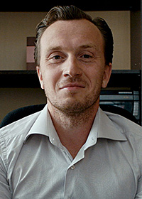 Денис Старков